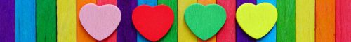 Vibrant Rainbow Backdrop Adorned With Various Heart Shapes